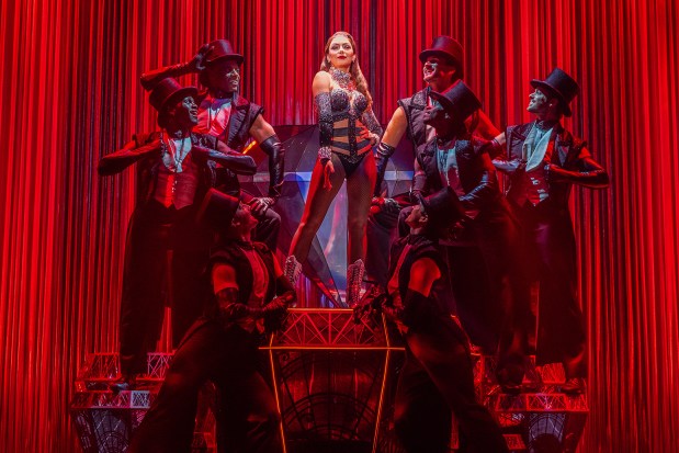 Arianna Rosario, center, as Satine, in the national touring production of "Moulin Rouge! The Musical." (Matthew Murphy)
