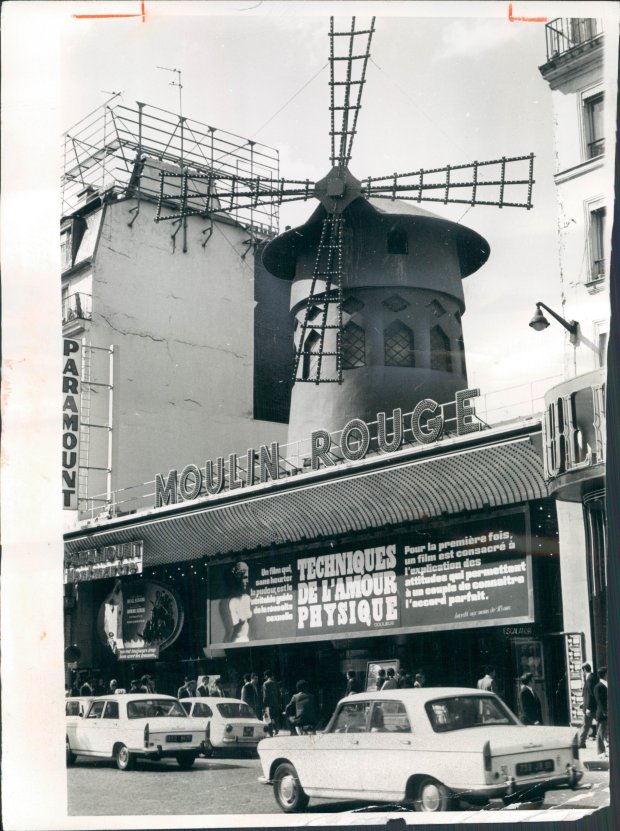 An historic photo of the Moulin Rouge nighclub in Paris, France. 
