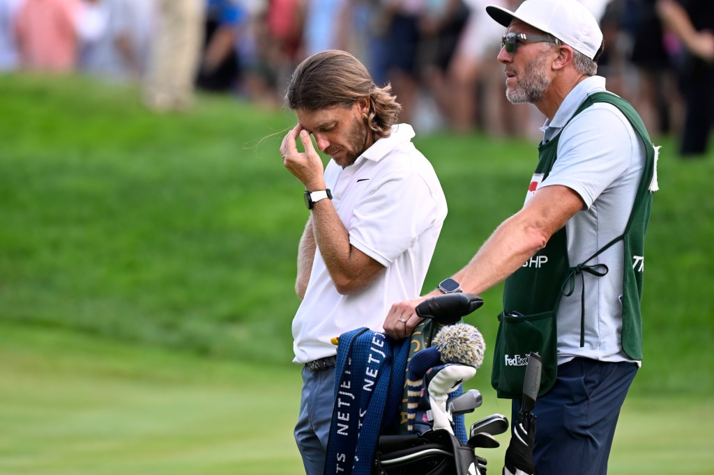 Tommy Fleetwood looking concerned during the Travelers Championship golf tournament.