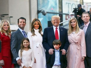 Republican presidential candidate Donald Trump stands with his wife Melania Trump (center left) and from right: son Eric Trump with his wife Lara Yunaska;  Vanessa Haydon and her husband Donald Trump Jr. In the front row are Kai Trump and Donald Trump III, children of Donald Trump Jr. on April 21, 2016 in New York City. The family appeaed at an NBC Town Hall at the Today Show.   (Photo by Spencer Platt/Getty Images)