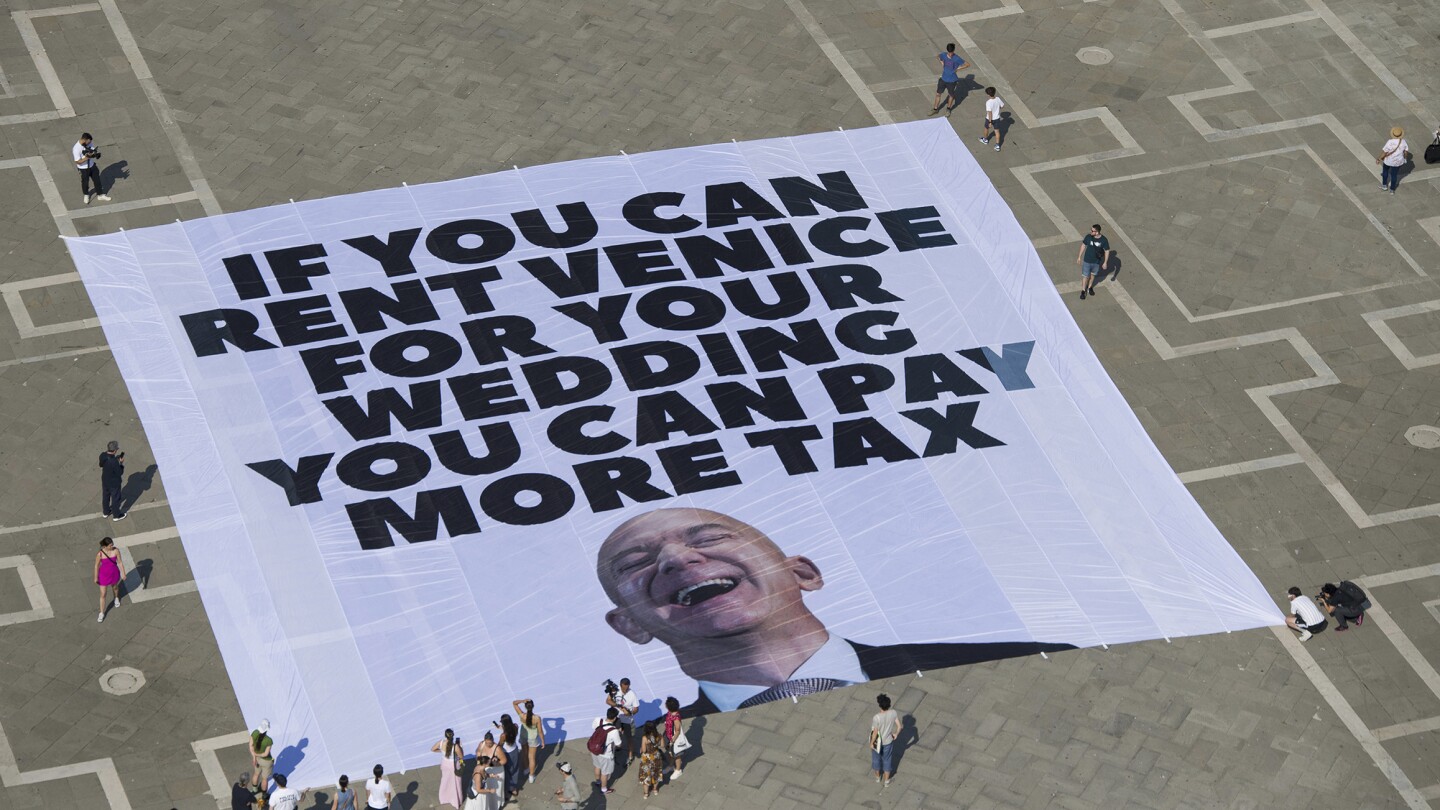 Protesters say Bezos' star-studded Venice wedding highlights growing inequality