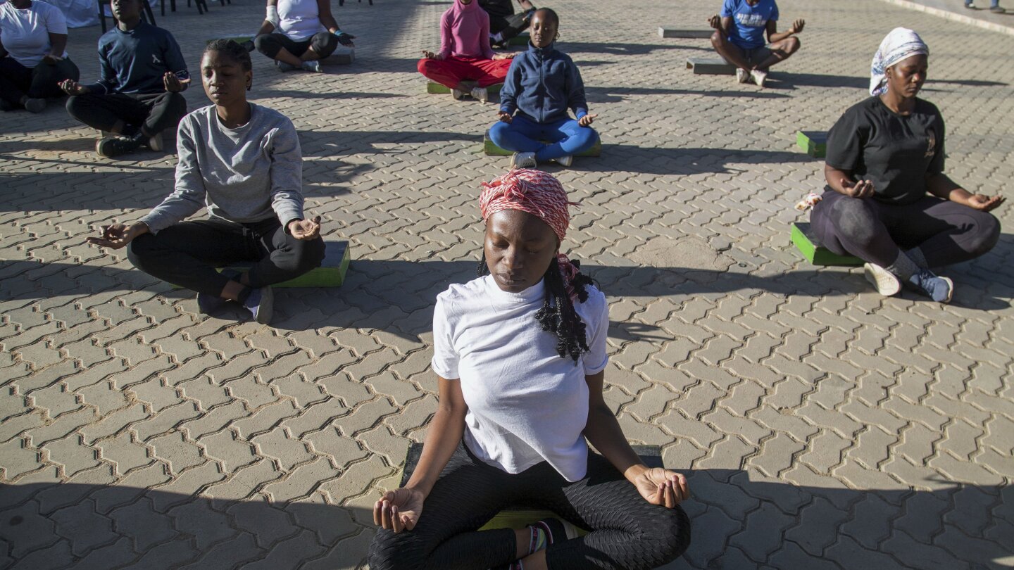 Yoga in a Zimbabwe bar is the latest mental health outreach in a struggling country