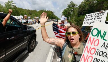 Protesters line highway in Florida Everglades to oppose 'Alligator Alcatraz'