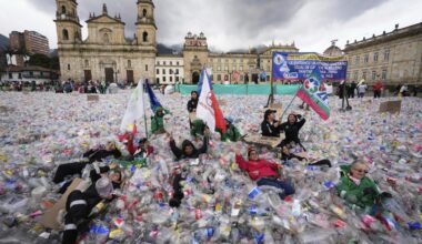 Colombian waste pickers inundate iconic Bogota square with plastic bottles to protest falling wages