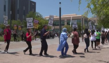 Dozens protest after UC San Diego Health lays off more than 200 employees