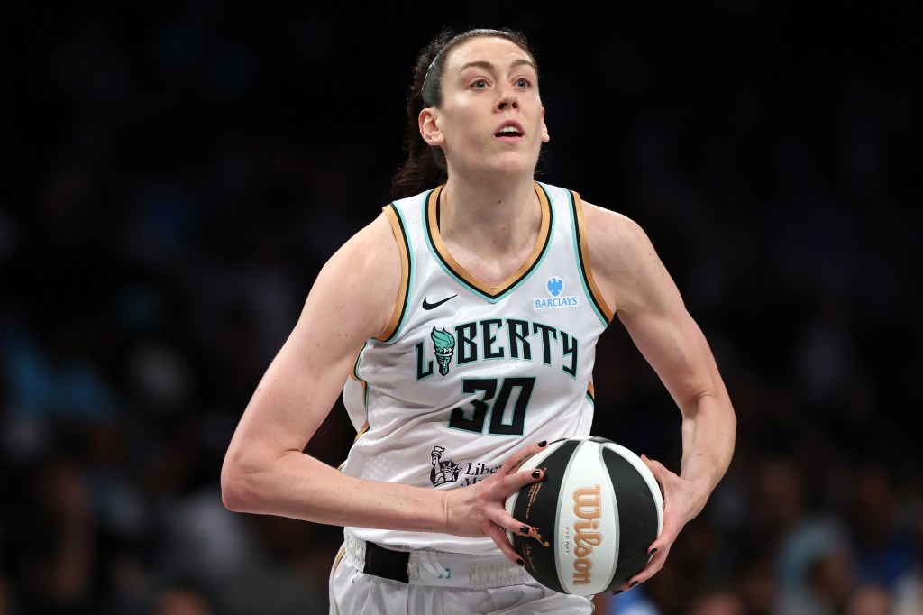 Breanna Stewart #30 of the New York Liberty dribbling a basketball.