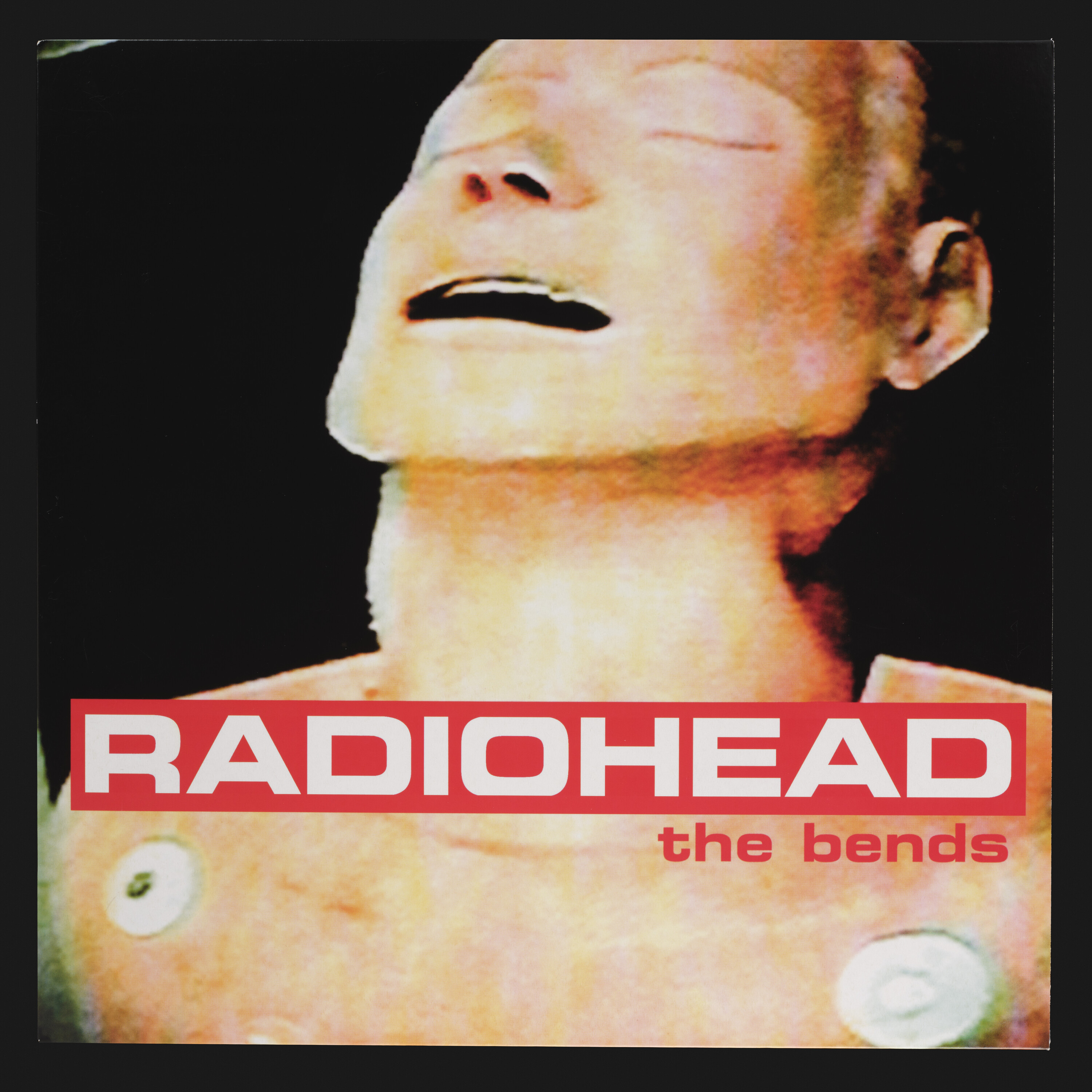 Radiohead's *The Bends* album cover.