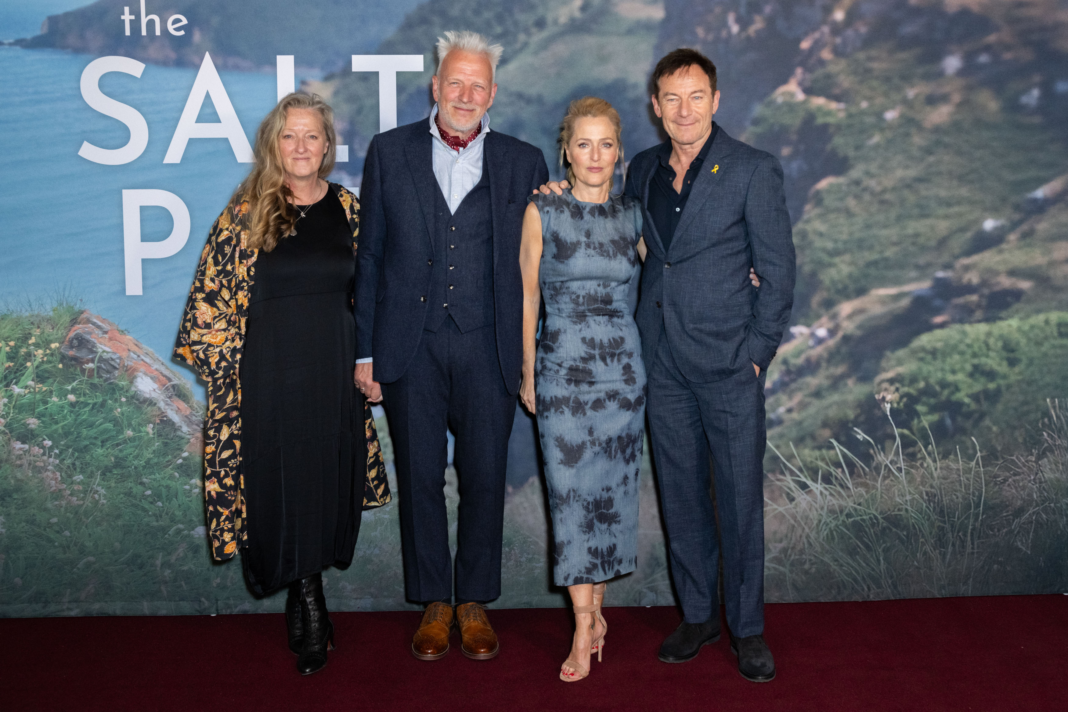 Raynor Winn, Moth Winn, Gillian Anderson, and Jason Isaacs at a film screening.