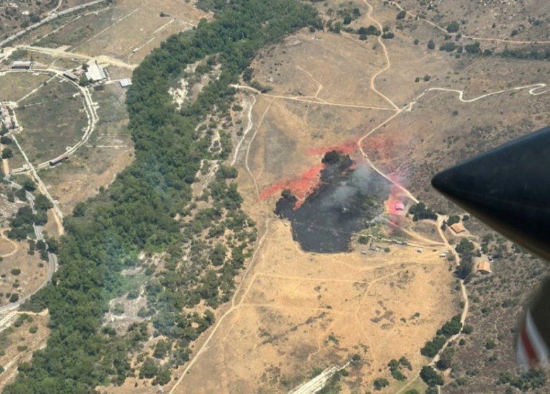 An aerial view of the remote terrain around the Pala fire.