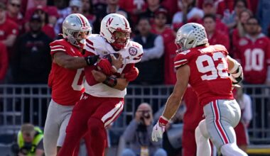 Ohio State Buckeyes linebacker Cody Simon (0) tackles Nebraska Cornhuskers quarterback Dylan Raiola (15) during the second half of the NCAA football game at Ohio Stadium in Columbus on Saturday, Oct. 26, 2024. Ohio State won 21-17.