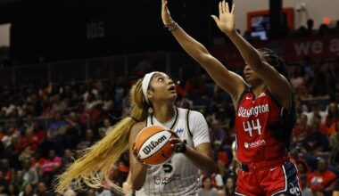 Jul 29, 2025; Washington, District of Columbia, USA; Chicago Sky forward Angel Reese (5) drives to the basket as Washington Mystics forward Kiki Iriafen (44) defends in the first half at CareFirst Arena. Mandatory Credit: Geoff Burke-Imagn Images