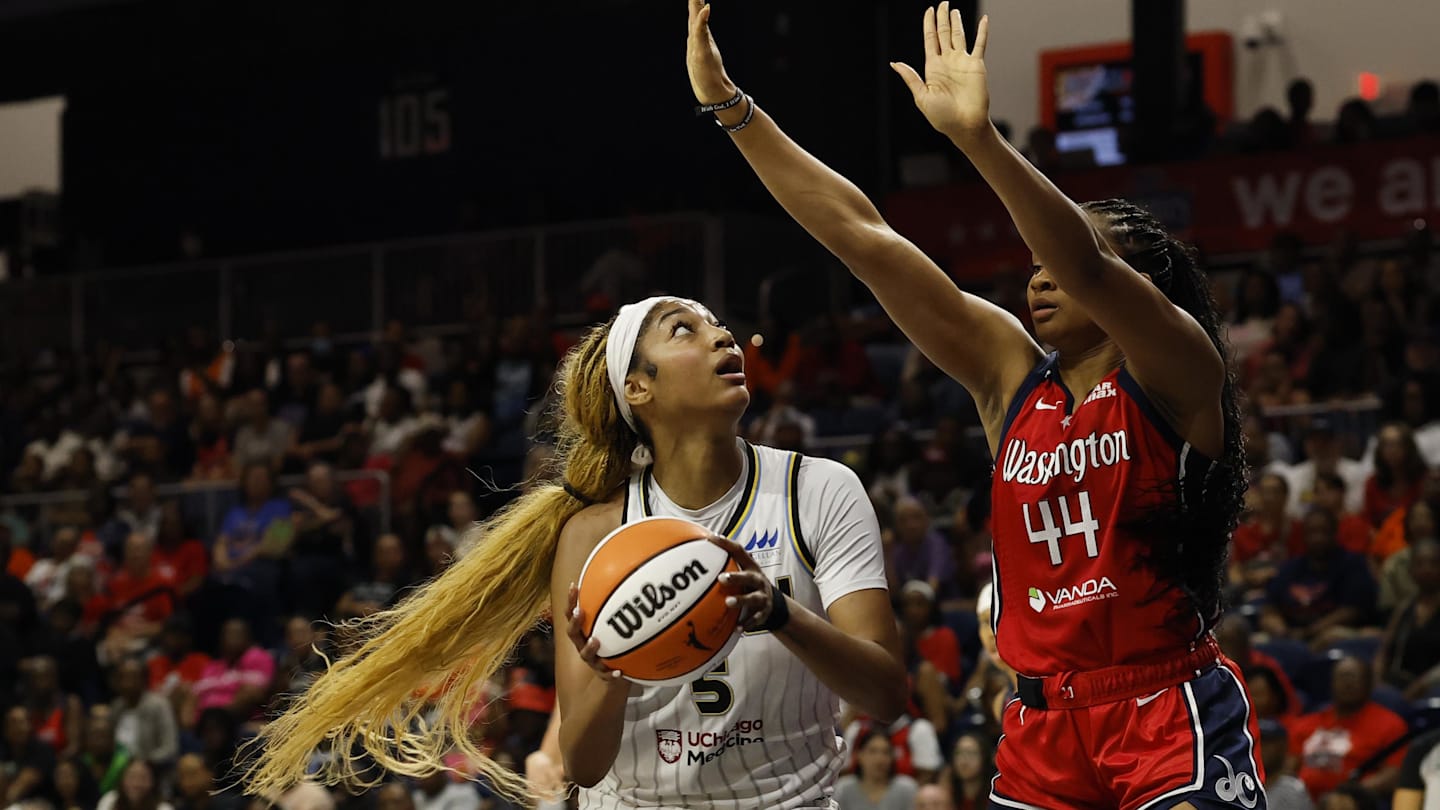 Jul 29, 2025; Washington, District of Columbia, USA; Chicago Sky forward Angel Reese (5) drives to the basket as Washington Mystics forward Kiki Iriafen (44) defends in the first half at CareFirst Arena. Mandatory Credit: Geoff Burke-Imagn Images