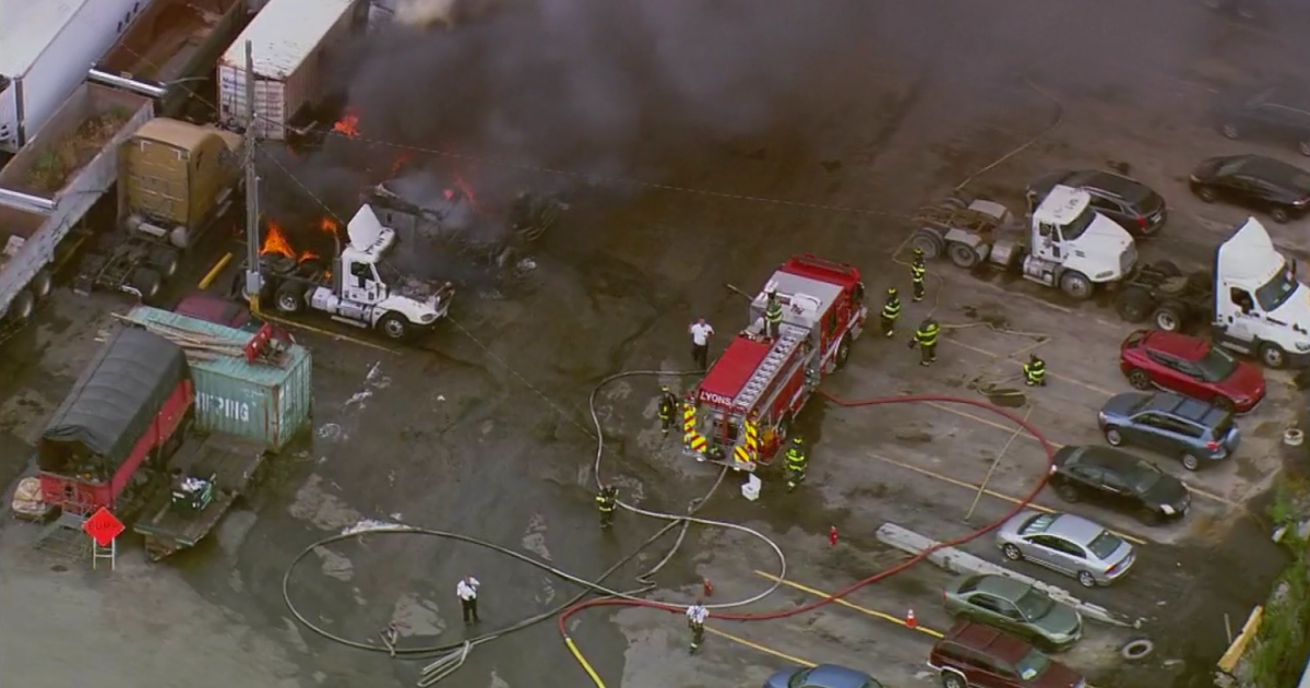 Semi-trucks on fire at McCook, Illinois facility and lot