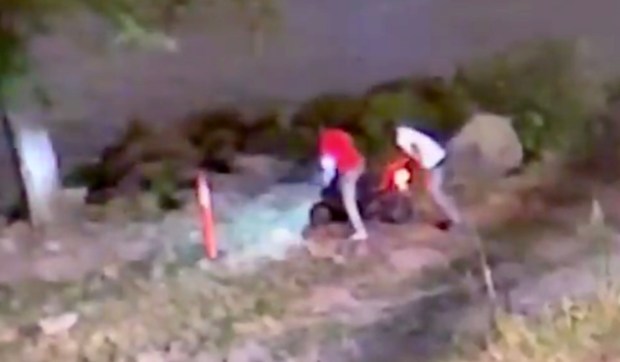 Video released by the Department of Homeland Security shows the suspects fleeing on a moped after the shooting.