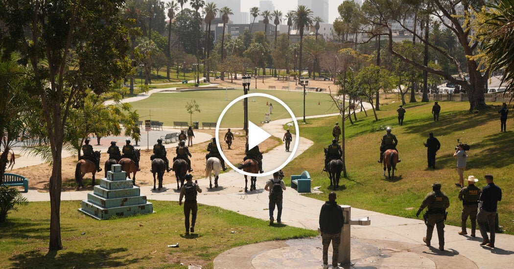 Federal Agents March Through MacArthur Park in Los Angeles