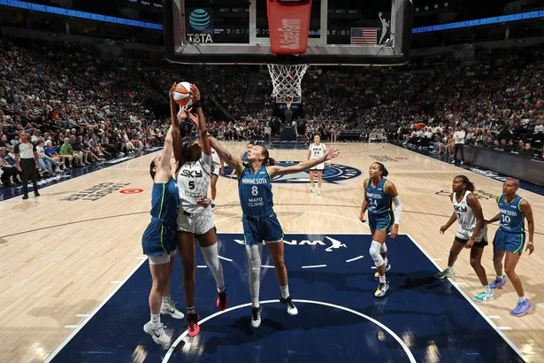 Angel Reese #5 of the Chicago Sky rebounds during the game against the Minnesota Lynx on July 6, 2025 at Target Center in Minneapolis, Minnesota