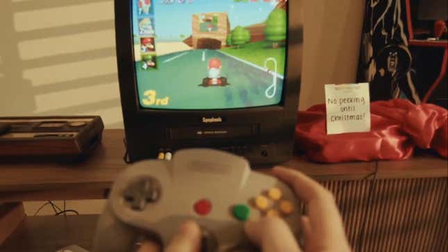 An N64 controller appears in front of a CRT playing Mario Kart 64.