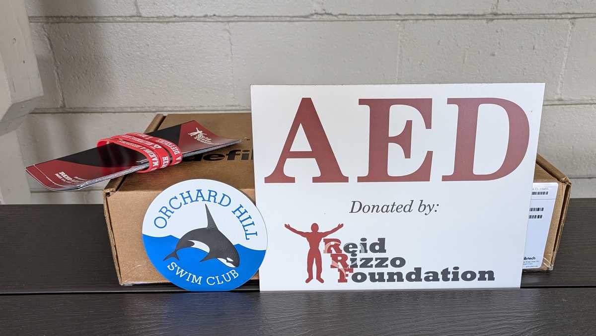 Family honors former La Salle star's memory by donating AED to swim club