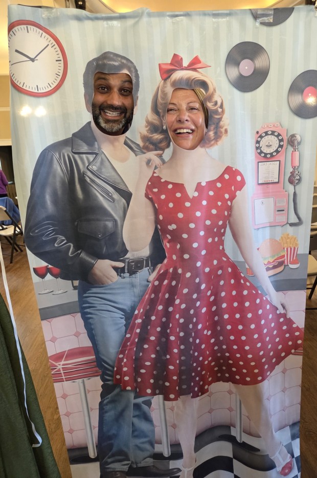 Point Loma Rotary Club members Kali Mistry and Kay Barron take on a retro look to celebrate the club's founding in 1950. (Provided by Margaret Virissimo)