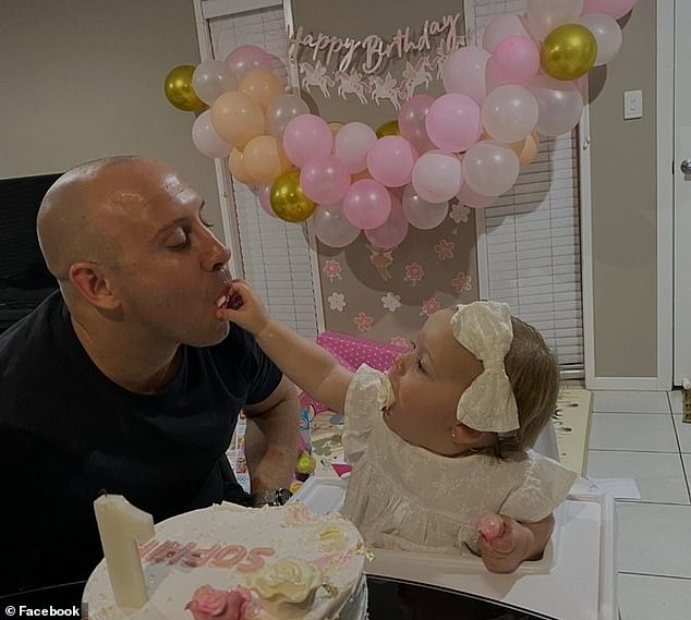 Sophia's first birthday was celebrated with a lavish cake. She is pictured with father Jai Ruane
