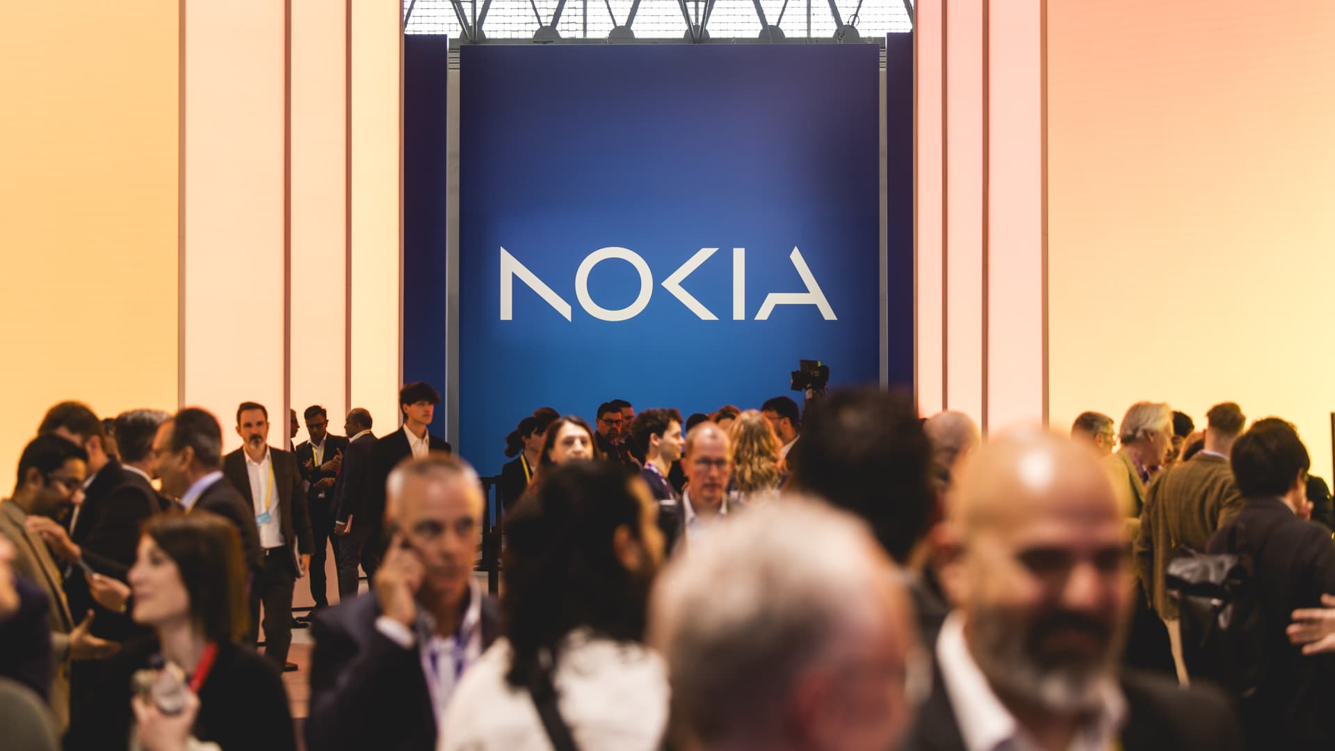 A logo sits illuminated at the Nokia booth in the Mobile World Congress 2024 on February 26, 2024 in Barcelona, Spain.