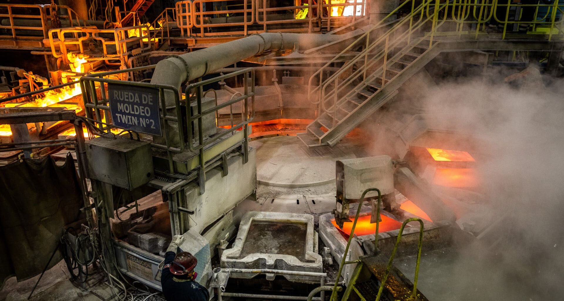 Mining firms power UK stocks to record high