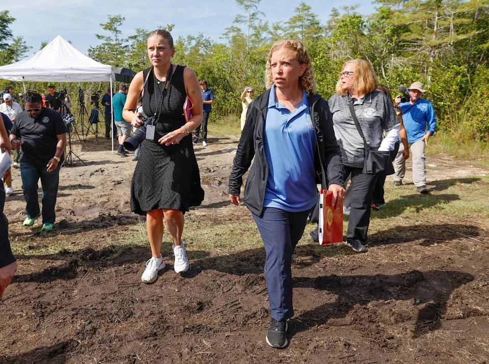 U.S. Representative Debbie Wasserman Schultz walks to her vehicle after a press conference before touring Alligator Alcatraz. The facility is within the Florida Everglades, 36 miles west of the central business district of Miami, in Collier County, Florida Saturday, July 12, 2025.