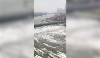 Hundreds ride across NYC river in jet ski invasion