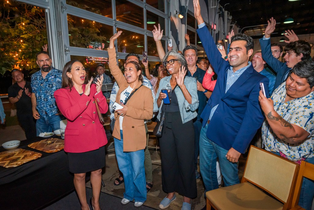 Imperial Beach Mayor Paloma Aguirre and supporters cheer early results on Tuesday, July 1, 2025, at Novo Brazil Brewery. She had a six-point lead ahead of her opponent, Chula Vista Mayor John McCann, as of 10 p.m. / Photo by Vito di Stefano