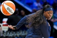 Dallas Wings guard Arike Ogunbowale warms up before a WNBA basketball game against the Las...