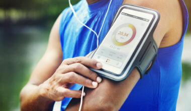 man-running-tracker-armband-fitness-app-tracker