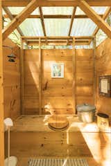 The composting toilet is situated in an outhouse on the property. 