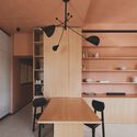Terra and Vidru House / Architecture for Humans + Federico Cartamantiglia + Fabrizio Carboni + Enrico Manca - Interior Photography, Closet, Wood, Lighting, Table, Shelving, Chair