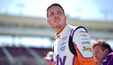 Denny Hamlin answers questions from reporters during Media Day at Daytona International Speedway, Wednesday, Feb. 12, 2025.