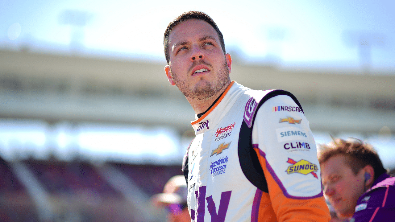 Denny Hamlin answers questions from reporters during Media Day at Daytona International Speedway, Wednesday, Feb. 12, 2025.