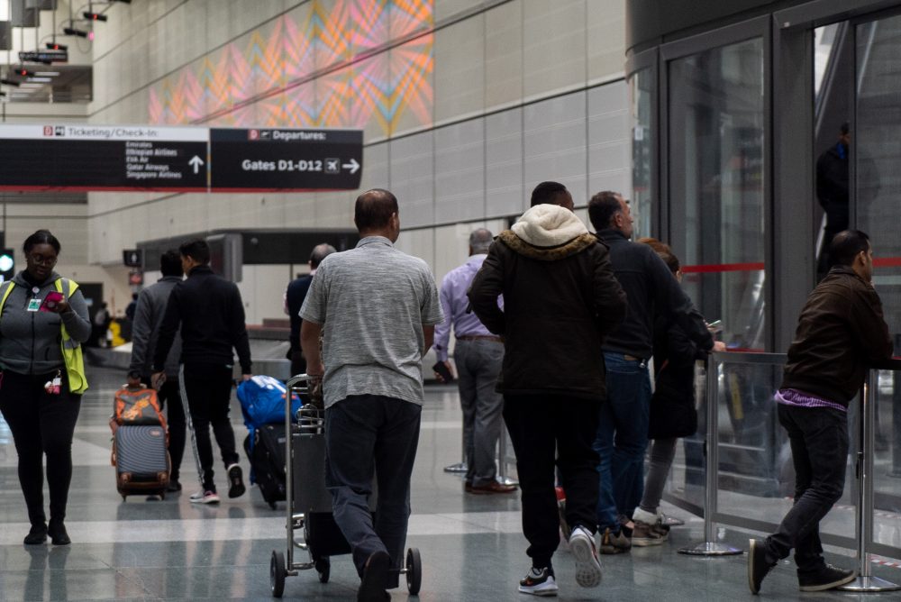 People traversing George Bush Intercontinental Airport. Taken on Feb. 20, 2020. 