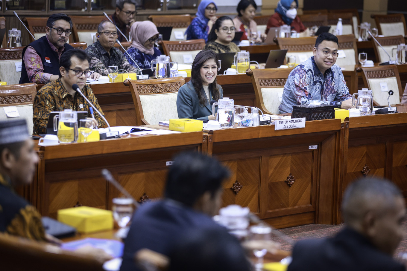 Communications and Digital Minister Meutya Hafid (center) attends a working meeting with House of Representatives Commission I on Nov. 5, 2024, along with her deputy ministers Nezar Patria (left) and Angga Raka Prabowo (right), at the Senayan legislative compound in Jakarta.