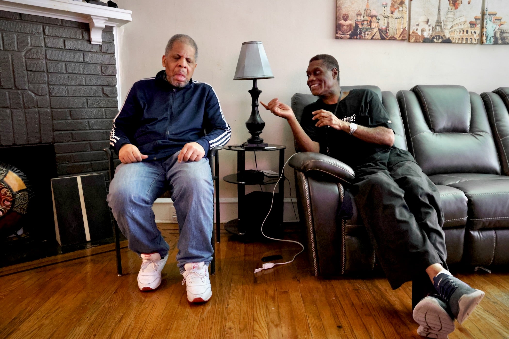 The Senior Companion Program's Joseph Dennis sits with James Henry