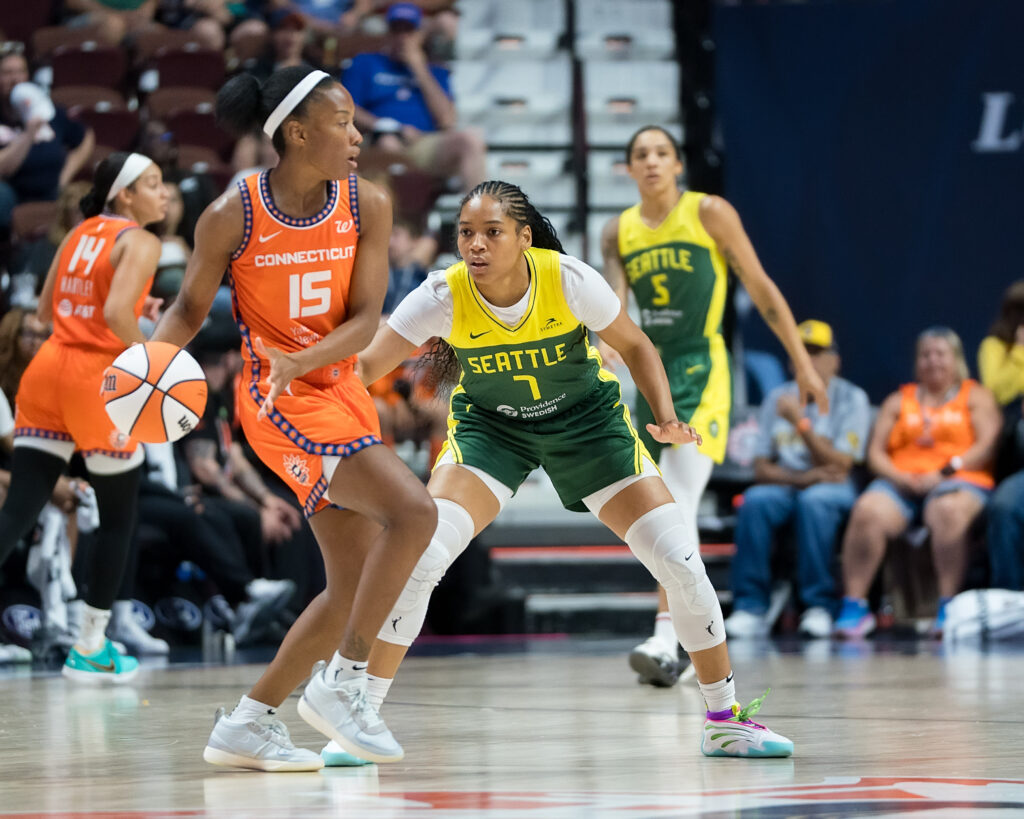 Seattle Storm guard Zia Cooke defends Connecticut Sun guard Lindsay Allen during the WNBA game between the Seattle Storm and the Connecticut Sun at Mohegan Sun Arena in Uncasville, Connecticut on July 9, 2025.