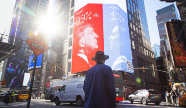 A billboard for Kalshi showing 2024 US presidential election odds.