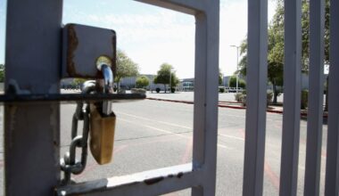 One of the many gates to Betty Fairfax High School is locked during a teachers strike May 1, 2018, in Laveen. A student walking across the street near Fairfax High was seriously injured in 2021, and the state Supreme Court ruled Tuesday the school is not responsible in the care of the students prior to arriving on campus. (Associated Press/Ross D. Franklin)
