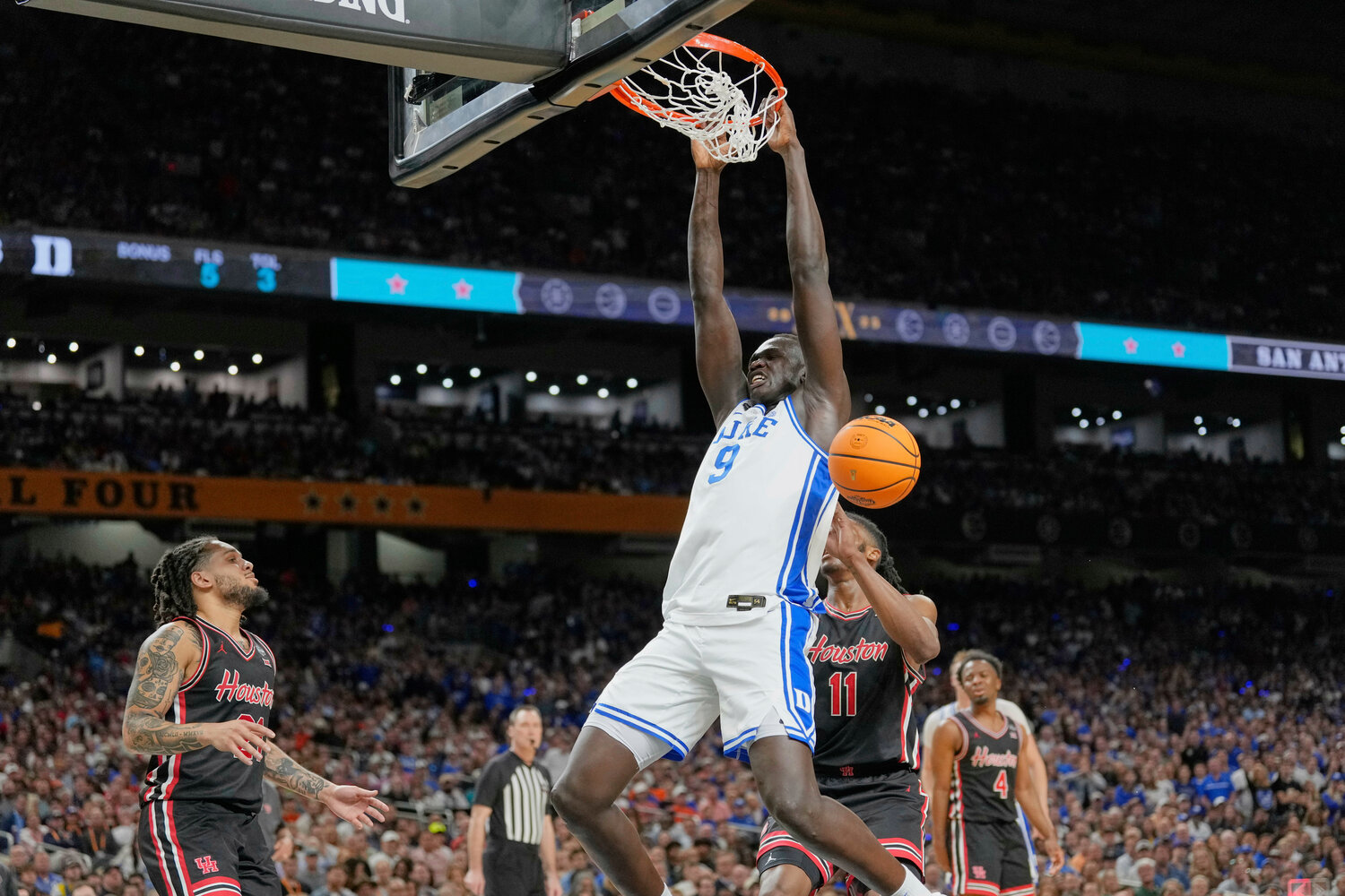 Duke center Khaman Maluach dunks against the Houston during the first half in the national semifinals at the Final Four of the NCAA college basketball tournament. The Suns took Maluach with its No. 10 pick in this year’s NBA draft.