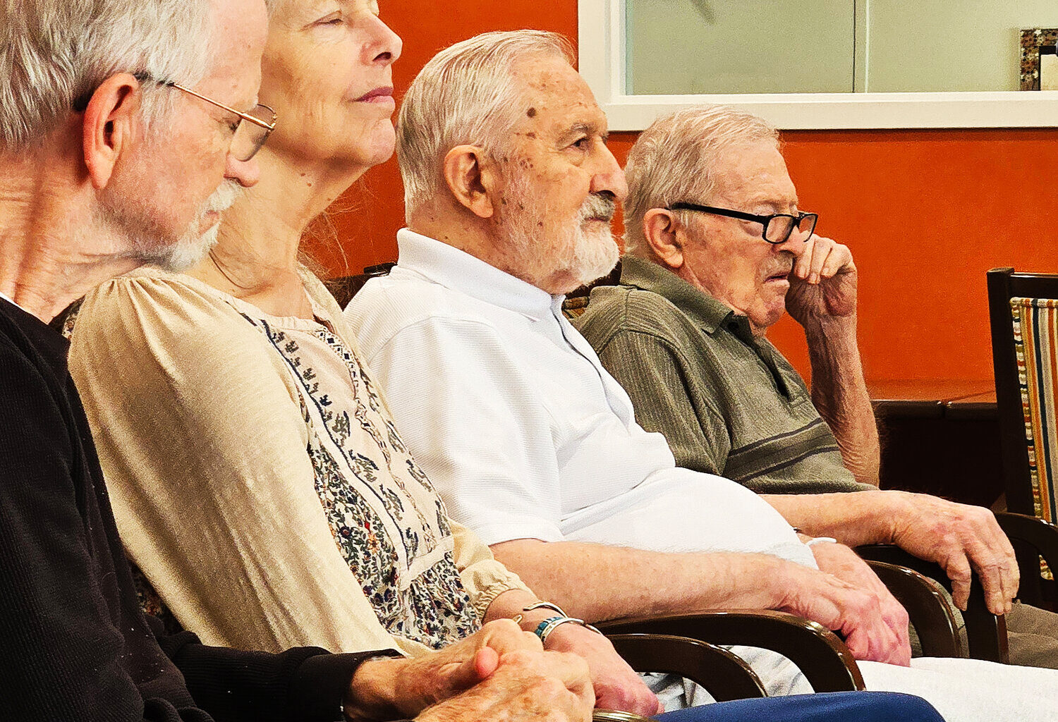 Residents at Memory Care at Friendship Village in Tempe experience a live brass quintet performance from Phoenix Symphony members on July 30.