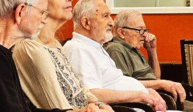 Residents at Memory Care at Friendship Village in Tempe experience a live brass quintet performance from Phoenix Symphony members on July 30.