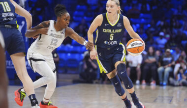 Dallas Wings guard Paige Bueckers (5) drives against Las Vegas Aces guard Chelsea Gray (12) dur ...