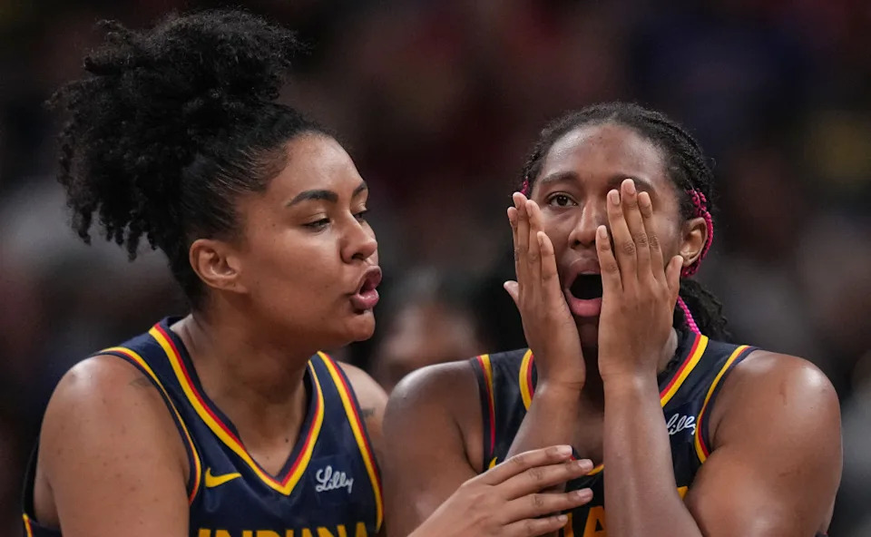 Indiana Fever forward Aliyah Boston (7) reacts to a foul as Indiana Fever forward Damiris Dantas (12). Grace Hollars&sol;USA TODAY Network via Imagn Images
