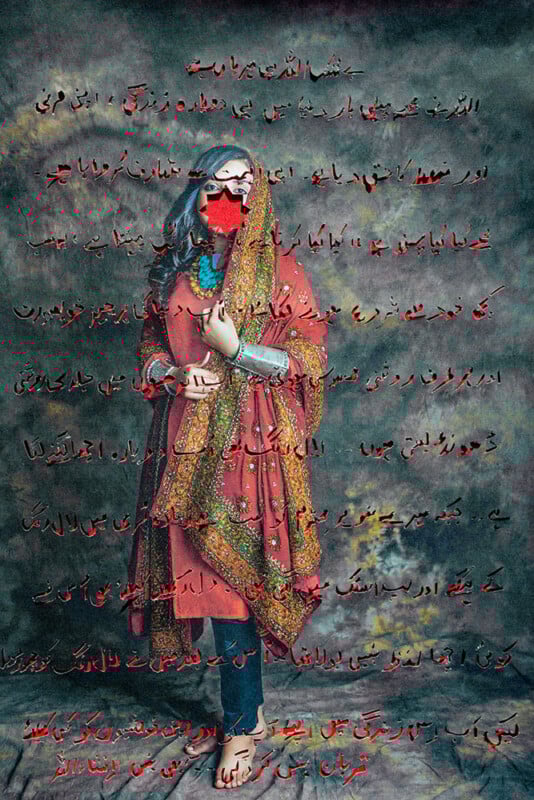 A woman in a red traditional outfit with a patterned dupatta stands barefoot against a mottled backdrop. Urdu text is overlaid across the image in red and black.