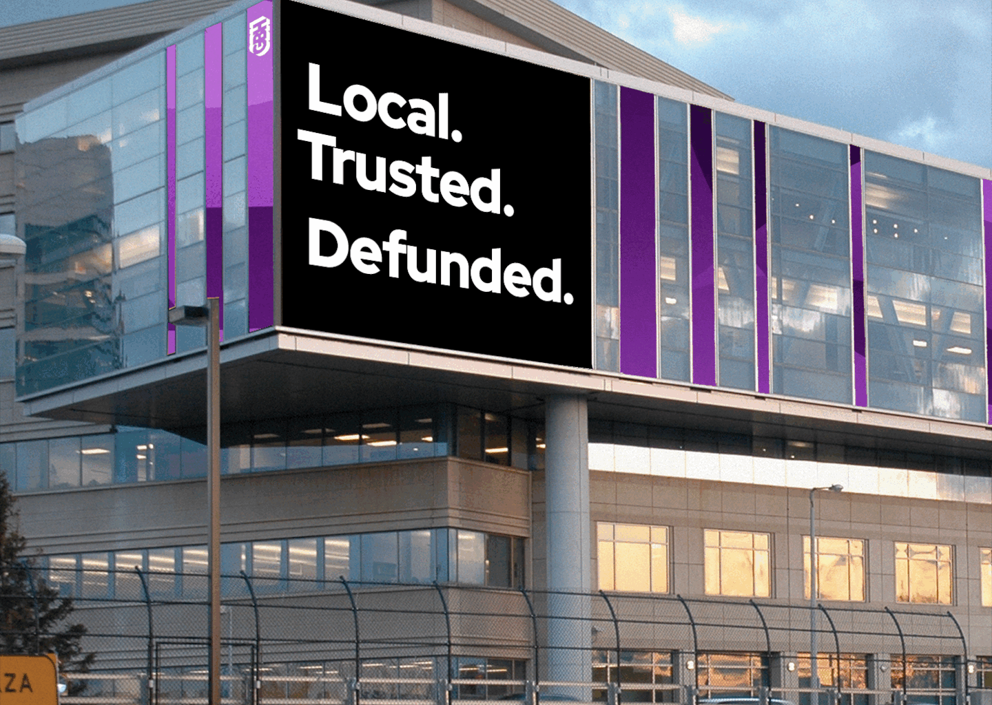 A GBH mural displayed on the organization's headquarters in Brighton after Congress approved a rescissions package that will cut $1.1 billion for public media.