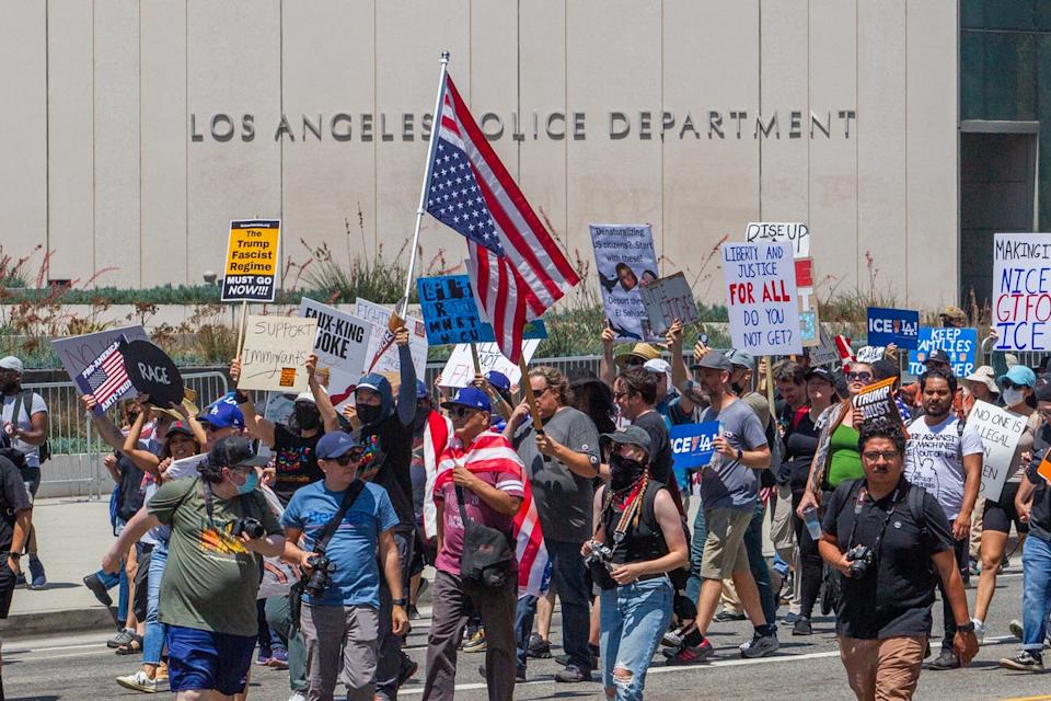 Demonstrators protest against ICE outside the Los Angeles Police Department on Independence Day (Getty Images)