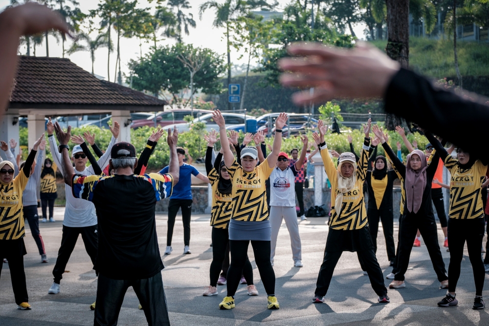 Despite participants spanning various age groups, most are senior citizens joining aerobics sessions led by Syed Abdul Rahman Syed Jaafar at Taman Merdeka today. — Bernama pic
